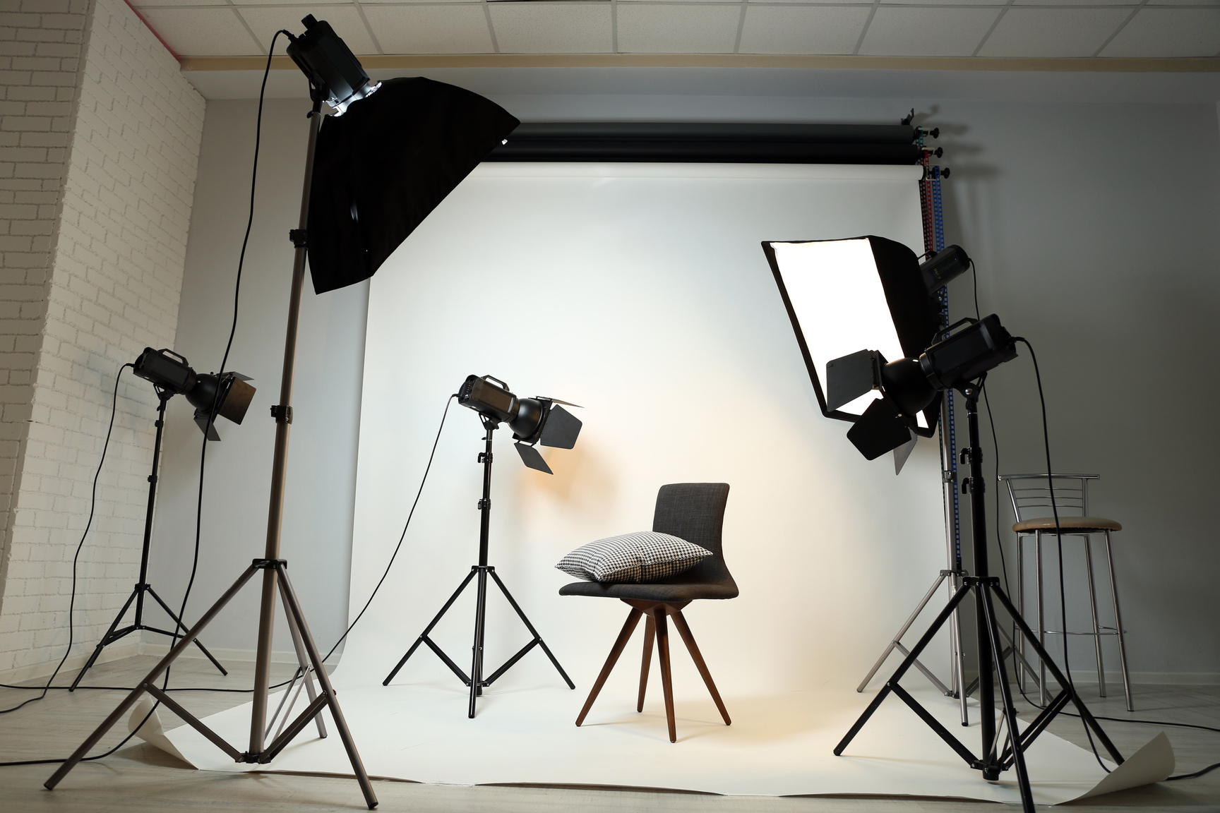 Photo Studio with Modern Chair and Pillow